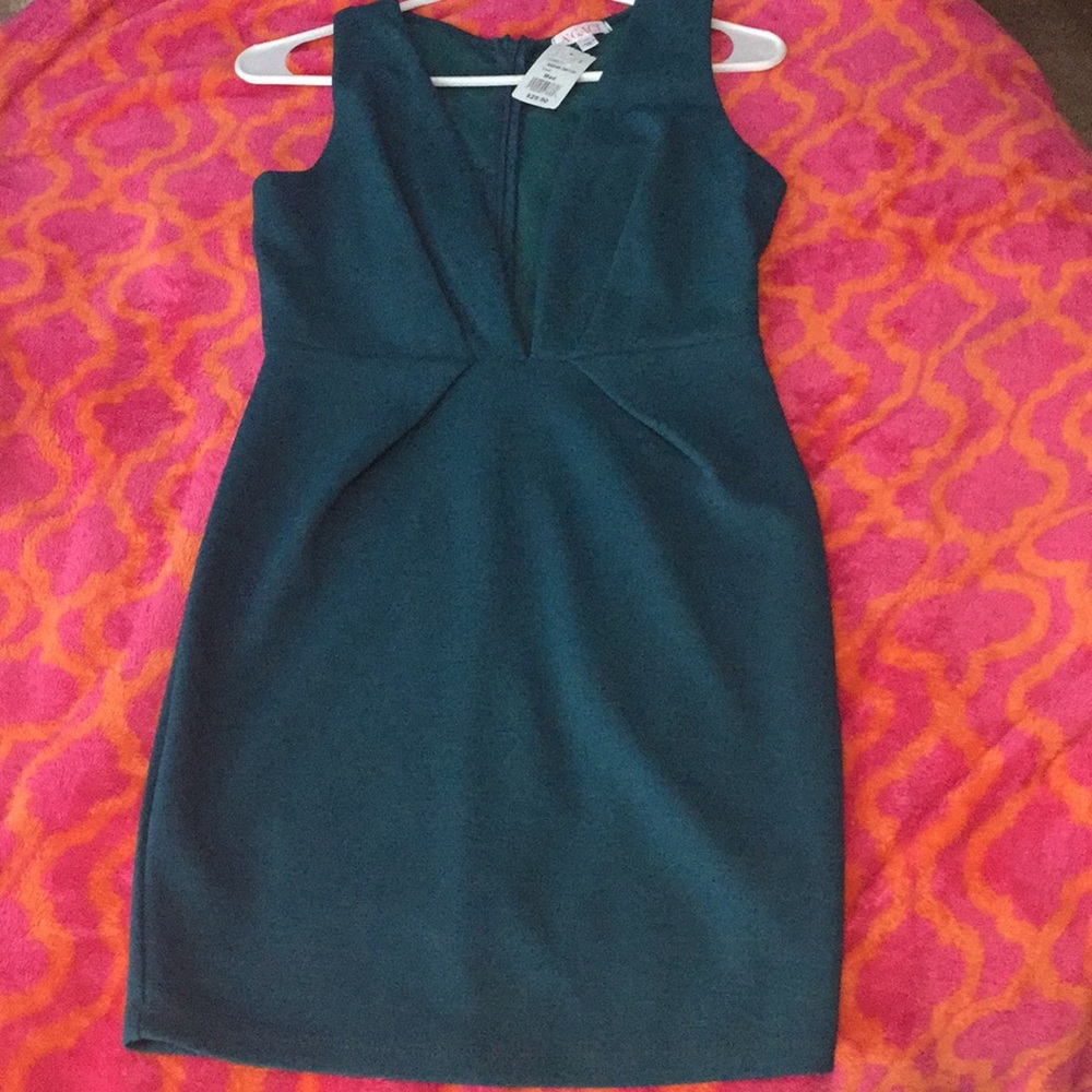 nwt Teal body con dress with plunging neckline